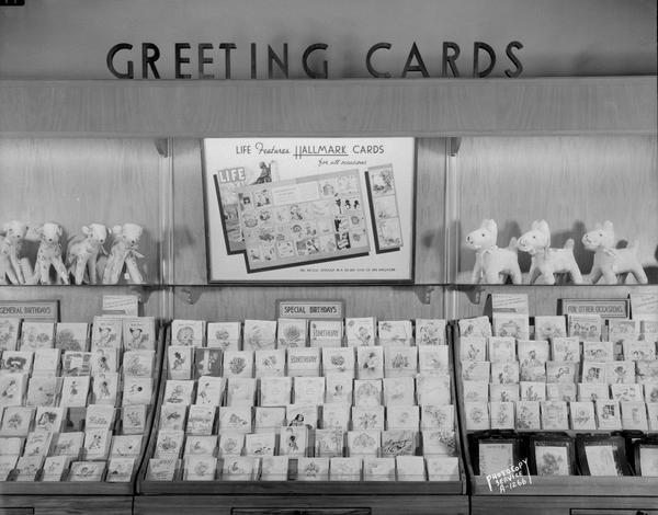 A display of Hallmark greeting cards, including a <i>Life</i> magazine article featuring Hallmark greeting cards, at an unidentified drug store in the Rennebohm chain.