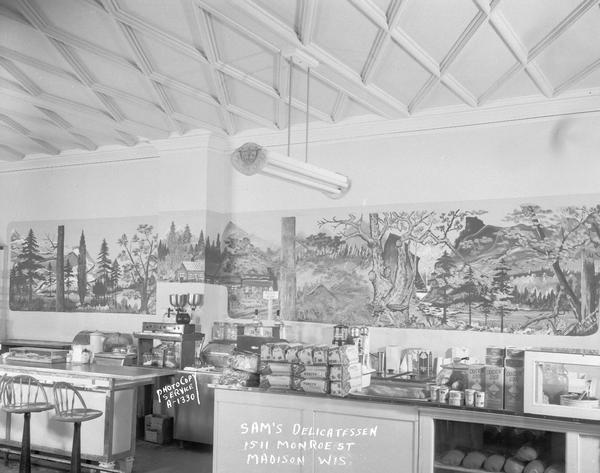 Mural of Norwegian scene by A. Dean Swift, on the right wall of Sam's Kosher Deli, 1511 Monroe Street, counter with food preparation equipment. Owned by Samuel and Frieda Fishman.