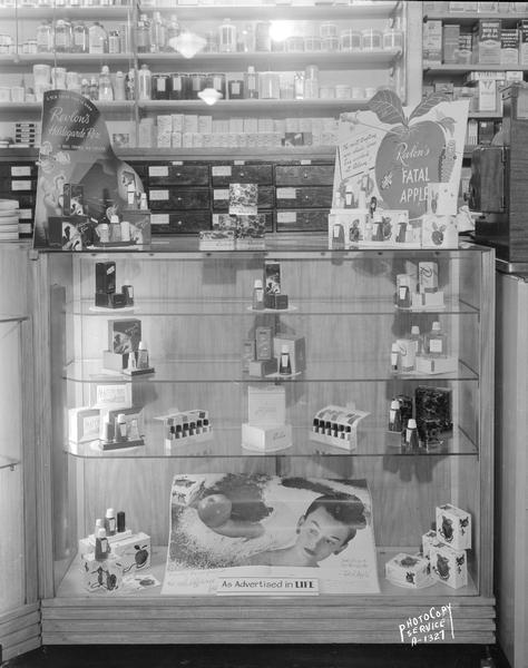 Revlon "Fatal Apple" cosmetics display in Rennebohm's drug store at 676 State Street.