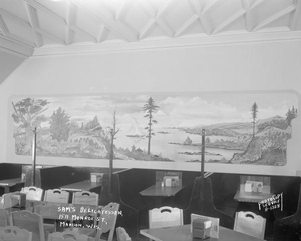 Mural of lake scene by A. Dean Swift, on back wall of Sam's Kosher Deli, 1511 Monroe Street, with booths, tables and chairs in the foreground. Owned by Samuel and Frieda Fishman.