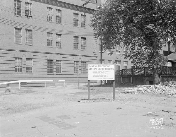 Site of the new Wisconsin Telephone Company central office building, to be constructed at corner of South Fairchild and West Main Streets. 16 S. Carroll Street.