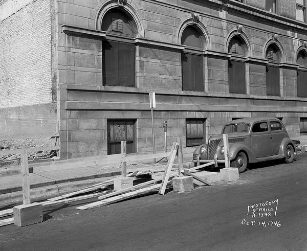 West Main Street side of the Park Hotel, including one automobile. Taken for Wisconsin Telephone Company.
