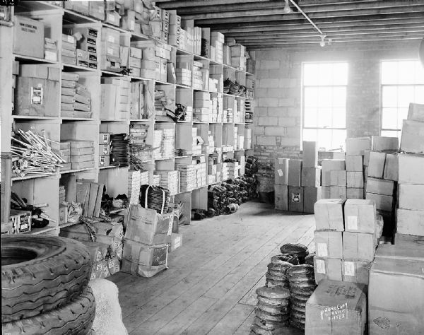 Interior of stockroom in Holmes Tire and Supply Company, 431 West Main Street.