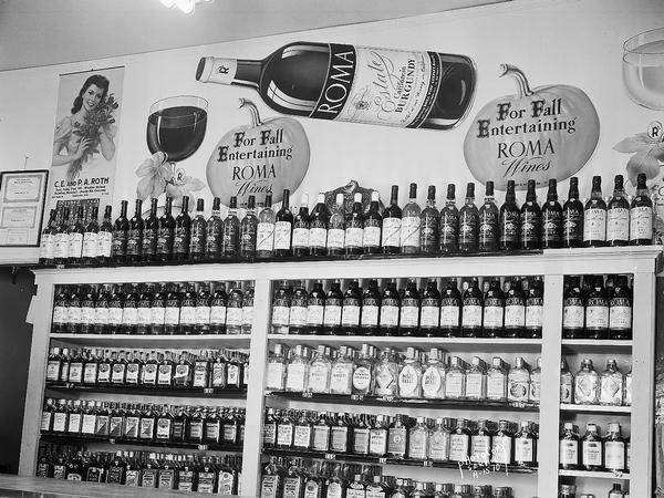 Roma Wine display, Sam's Liquor Store, 422 North Street, display shelves against an interior wall.