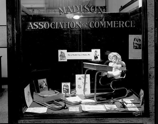 Display of child's folding desk made by WooDick Corporation, in Madison Association of Commerce window.