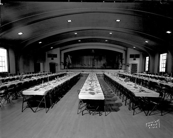 Turner Hall with tables set up for a banquet, 21 South Butler Street.
View from the doors toward the stage.
