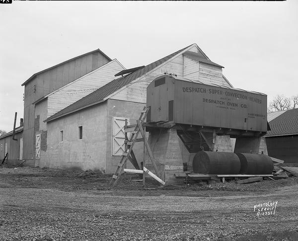 Blaney Hybred Seed Co. farm buildings, showing Despatch Super Convection Heater built by Despatch Oven Company, Minneapolis.