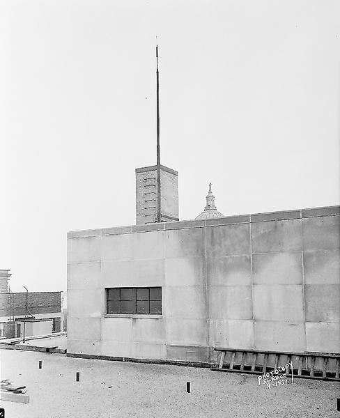 Wisconsin Telephone Company, 122 West Main Street, showing an antenna on top of the building for use with mobile telephone service.