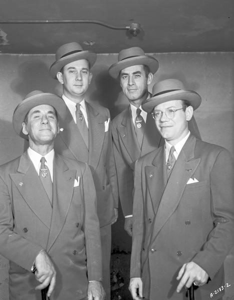 Publicity portrait of "The Cardinals" barbershop quartet.
