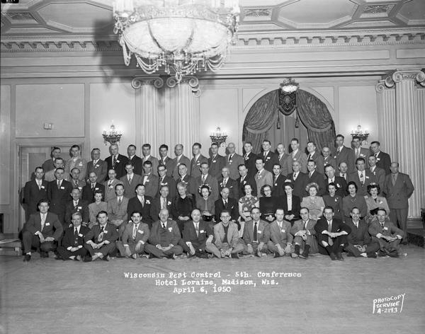 Group portrait of the 5th conference of the Wisconsin Pest Control, taken in the Crystal Ball Room of the Loraine Hotel.