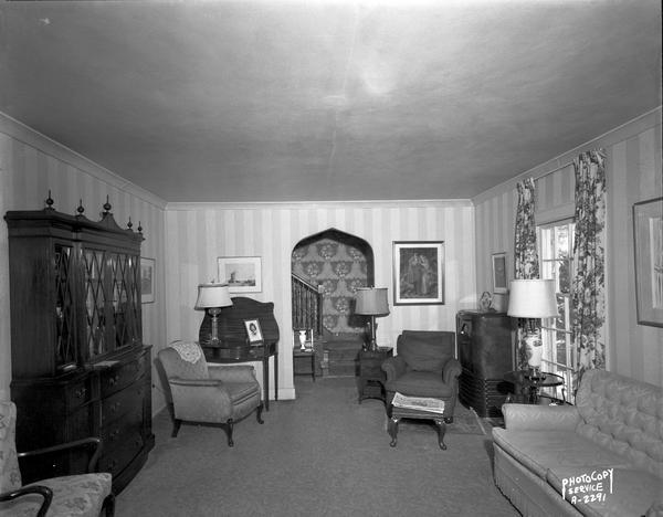 Interior view of the living room from the fireplace of the Joe & Leah Rothschild residence, 3722 Nakoma Road before remodelling.