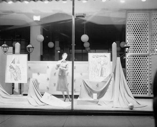 H.S. Manchester's, Inc., 2 East Mifflin Street, show window displaying Forstmann woolen fabric yard goods.