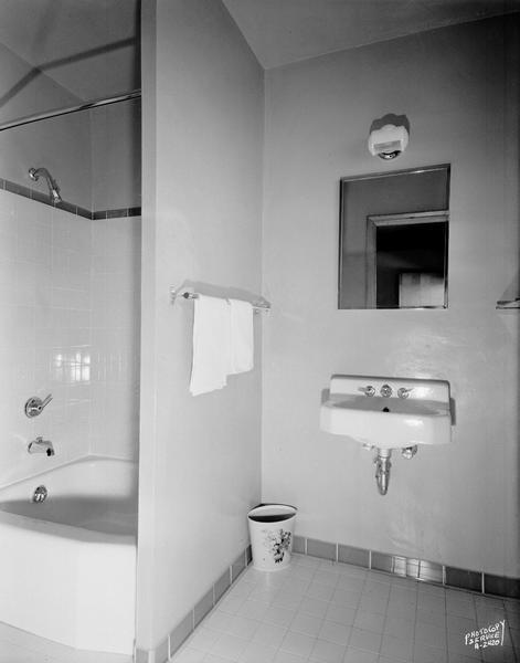 Interior of a bathroom at the Hamacher Motel, 5101 University Avenue, featuring Kohler fixtures.