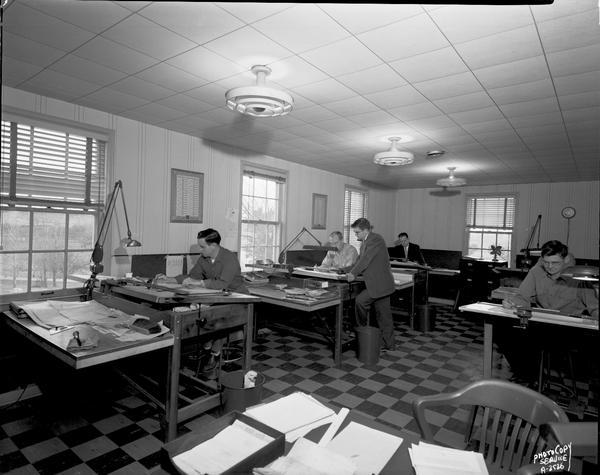 Five men in the drafting department at the W.R. Carnes Company.