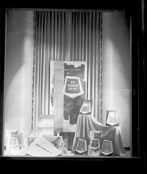 H.S. Manchester's, Incorporated, 2 East Mifflin Street, side window display #6, Libbey glassware, "Libbey everyday crystal, new dimensions for 1957."