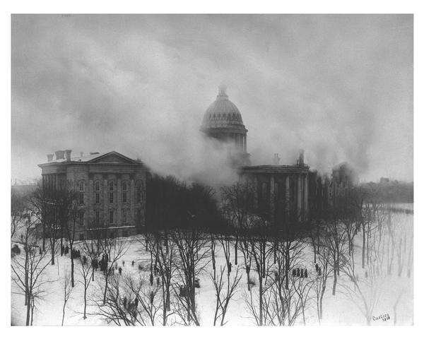 Elevated view of the third Wisconsin State Capitol ablaze.