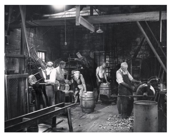 Interior view of Frank J. Hess and Sons barrel-making factory, 1952 Atwood Avenue at Schenck's Corners. Pictured l to r: Frank Jr., Edward, Joseph, Tony, and Frank Hess Sr.