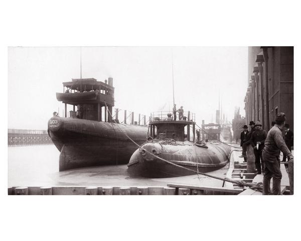 Captain Abe McDougall's whaleback boat, docked at the American Steel Barge Company.