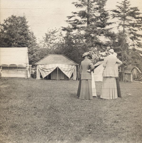 Women standing at General Fifield's Camp Stella at Sand Island, Apostle Island, Lake Superior.