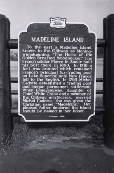 Madeline Island Sign (Wisconsin Official Marker) depicting the history of the island and how it recieved its name. This sign was erected in 1956.