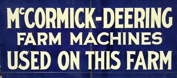 Advertising sign with the text: "McCormick-Deering Farm Machines Used on This Farm." The sign may have been intended for use with the "McCormick-Deering toy farm."