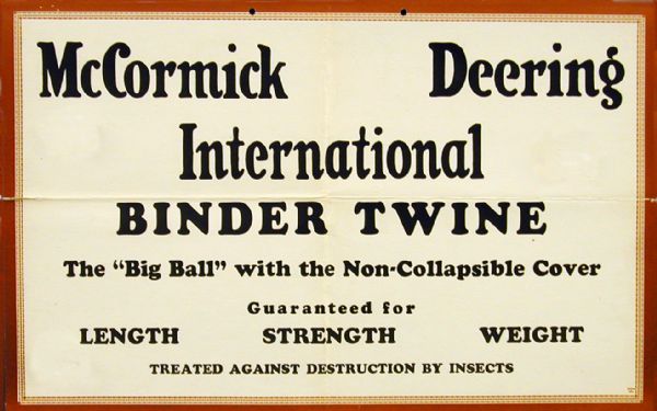 Display card advertising McCormick-Deering International Binder Twine.  The Big Ball twine is "Guaranteed for Length, Strength, Weight" and "Treated Against Destruction By Insects."