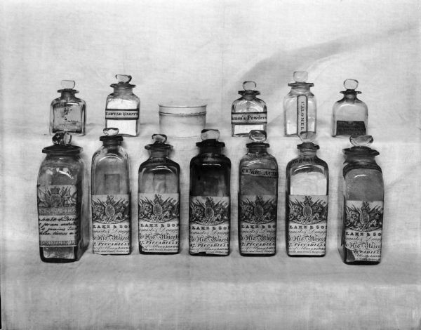 Display of 18th and 19th century English medicine bottles.