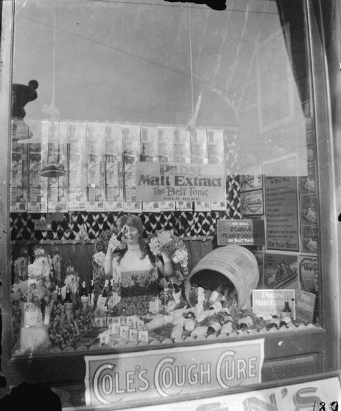 Eye catching Eagle Drugstore window display for Pabst Malt Extract, "The Best Tonic". An advertisement for this product stated that it was "the greatest tonic in the world for building up the nerves and helping men and women generally who are run down in health". It was also reportedly a cure for insomnia.