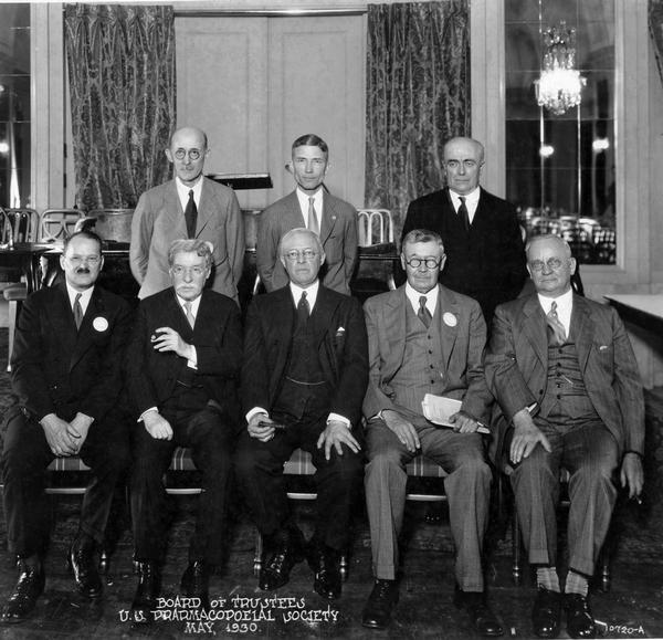 Members of the Board of Trustees from the United States Pharmacopeial Convention, 1930-40. Pictured: (standing) W.B. Day, E.F. Kelly, and W. Bruce Philip. (Standing) E. Fullerton Cook, S. Solis Cohen, W.A. Bastedo, J.H. Beal, and S.C. Henry.