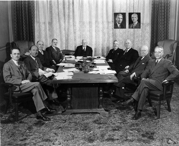 View of the U. S. Pharmacopeial Convention Board of Trustees, 1940-50. Pictured are, left to right: Adley Nichols (Secretary), Morris Fishbein, Patrick Costello, E. Fullerton Cook (Chairman of Committee of Revision), Robert Swain (Chairman), Cary Eggleston (President), Ernest Little, Walter Bastedo, W. Paul Briggs (Treasurer). Insets, left to right: E.F. Kelly (Chair, 1940-4) and C.W. Edmunds (President, 1940-1).