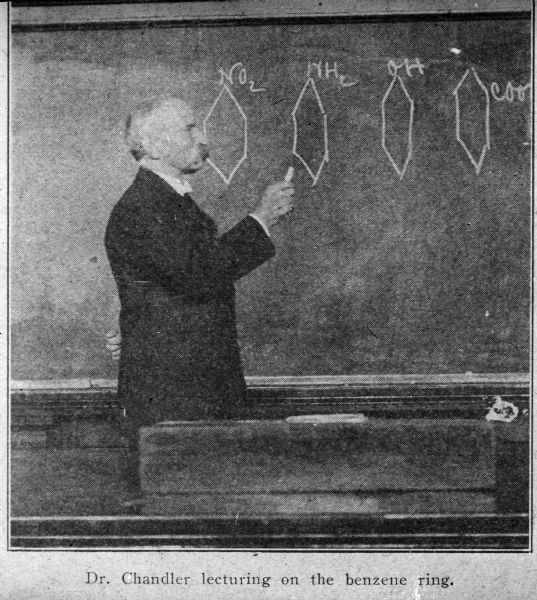 A Columbia University pharmacy professor, Dr. Charles Chandler, lectures on the chemical make-up of the benzene ring.