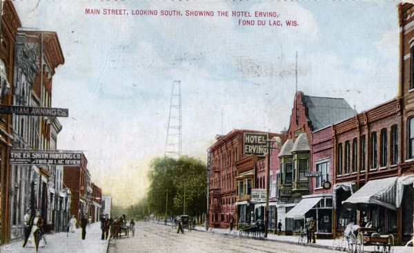View of businesses located on the south end of Main Street including The Hotel Erving, a shoe store, Utter Drug Company, a dentist, Graham Awning Co., and the E.R. Smith Printing Company. Caption reads: "Main Street, Looking South, Showing the Hotel Erving, Fond du Lac, Wis."