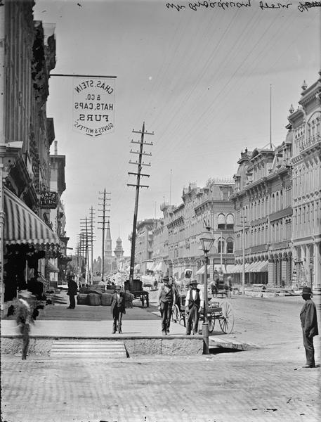 View up Broadway from Huron Street, with Charles Stein and Company on the left.