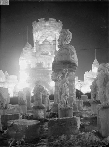 Night view of snow figures and east front of ice palace at the St. Paul Ice Carnival.