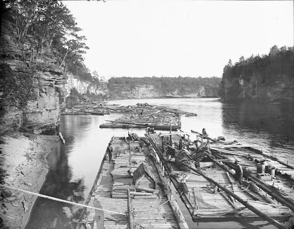 A fleet of rafts on the Wisconsin River below the Kilbourn dam.