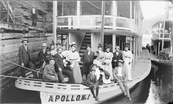 View of group of passengers posing on the bow of the "Apollo No. 1" steamboat.