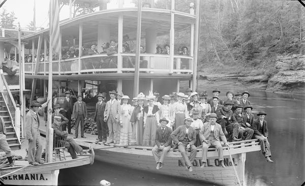 View of the "Apollo No. 1" steamboat and passengers. The side of the steamboat "Germania" is at left.
