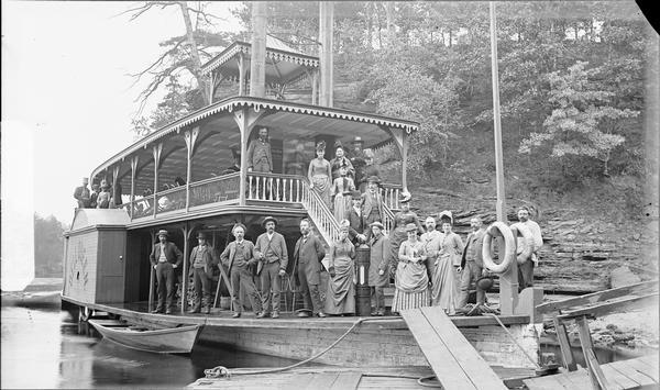 Passengers posing on the "Dell Queen" steamboat.