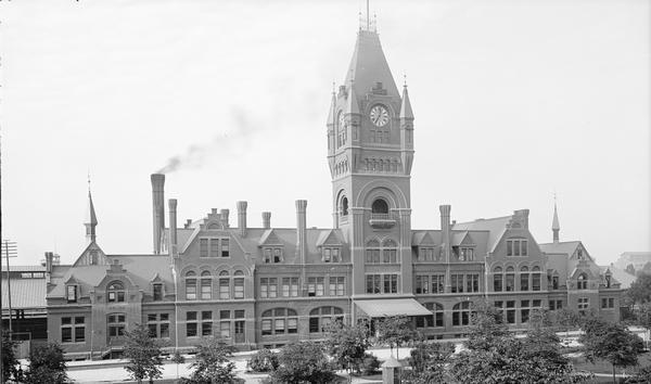 Chicago, Milwaukee and St. Paul Depot, with clock tower, at West Everett Street between North 3rd and North 4th Streets.