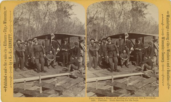 Stereograph of a group of men standing and sitting on a raft, watching Dick Stevenson in the center dancing. Zack Dugas is at left clapping time, and Jack Warnock is sitting facing the camera. Big Archie Young is near the center pole.