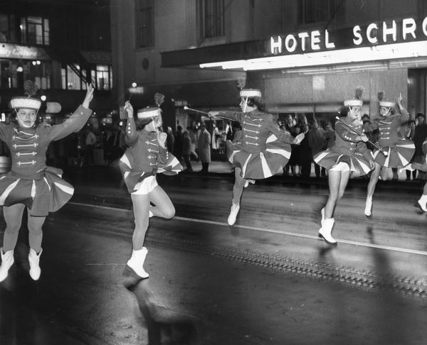 Majorettes dancing in a parade. They were members of the Milwaukee Continentals marching band.