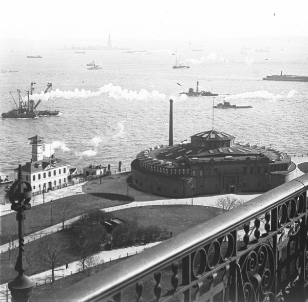 Elevated view, probably early 20th century New York Harbor.