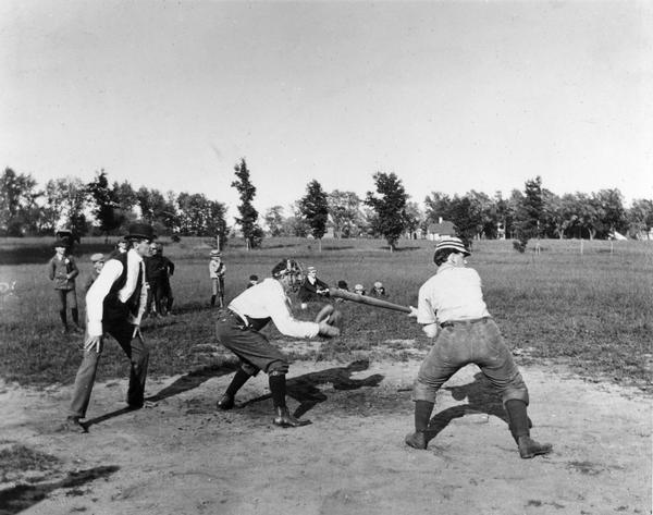 The faculty at the University of Wisconsin-Whitewater play a game of baseball.