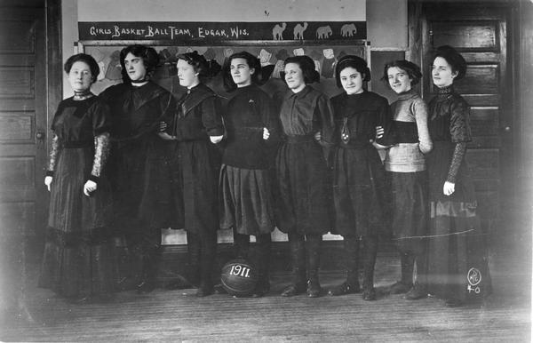 Group portrait of women's basketball team.