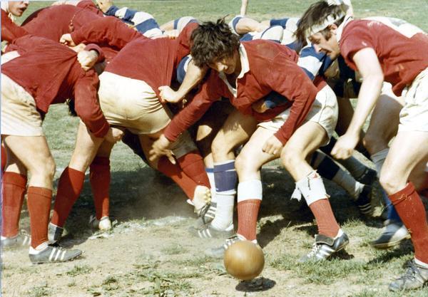 A rugby game in action.