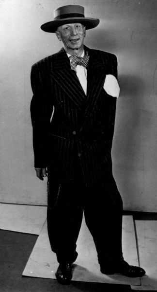 Man posing in a Zoot suit.