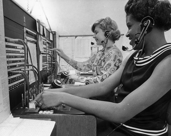 Two female telephone operators at work.