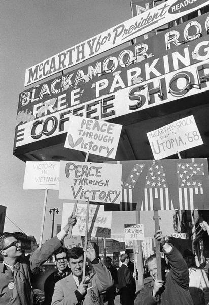Protesters, members of the Milwaukee Americans for Freedom, demonstrate against presidential candidate Eugene McCarthy and in favor of the Vietnam war.