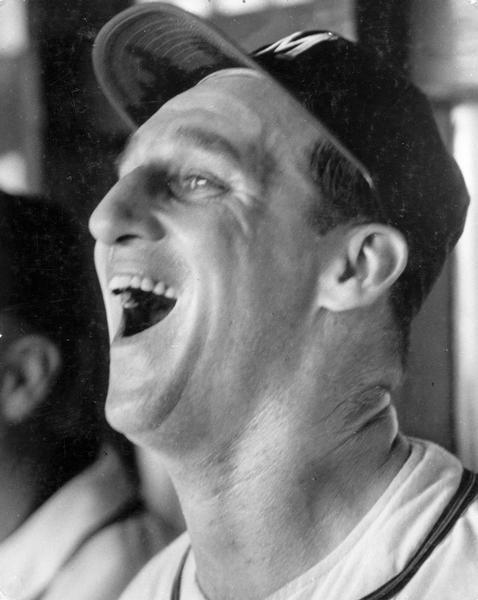 Warren Spahn, of the Milwaukee Braves enjoying a moment in the bullpen.