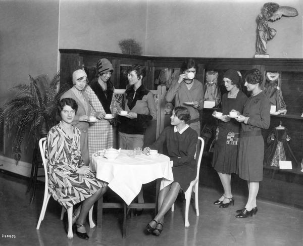 University of Wisconsin home economics students have a tea party.